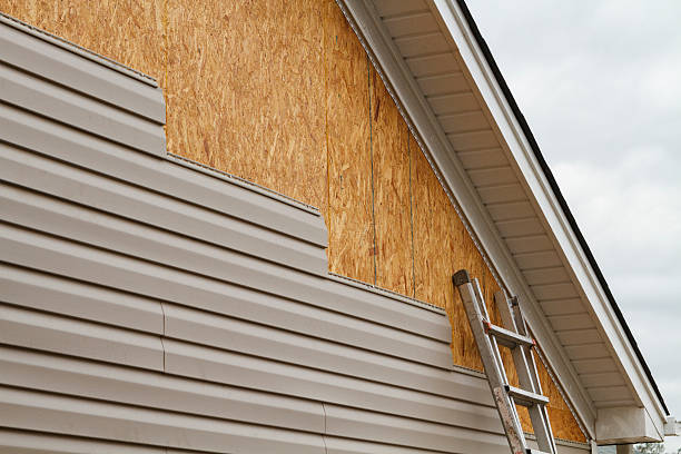 Professional Siding Installation technician working in Neelyton, PA